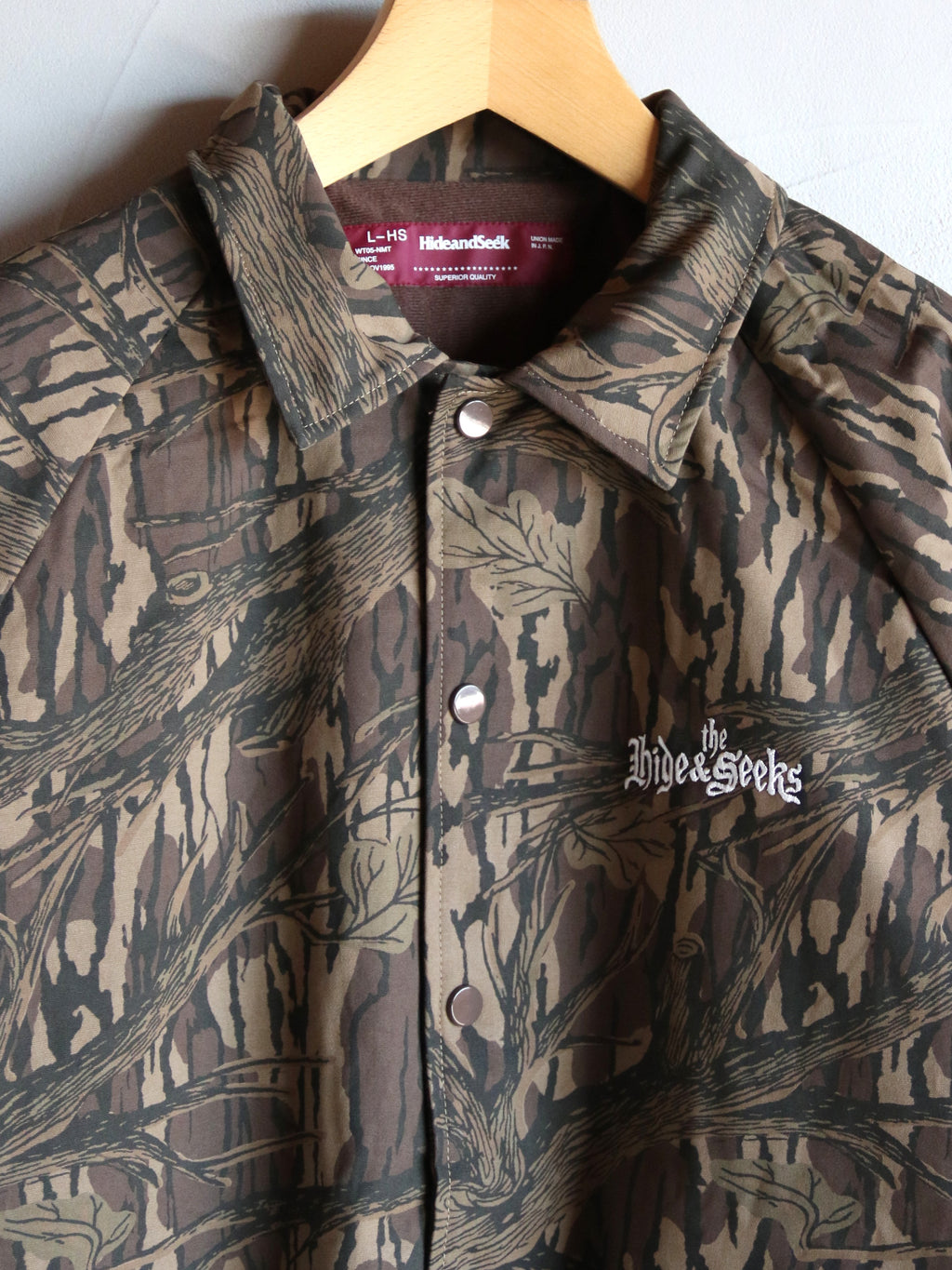【2026年10月10日 12時から販売開始】HideandSeek×Toru Nishiura / The H&S Team Jacket (Camo) / H30th-091326c