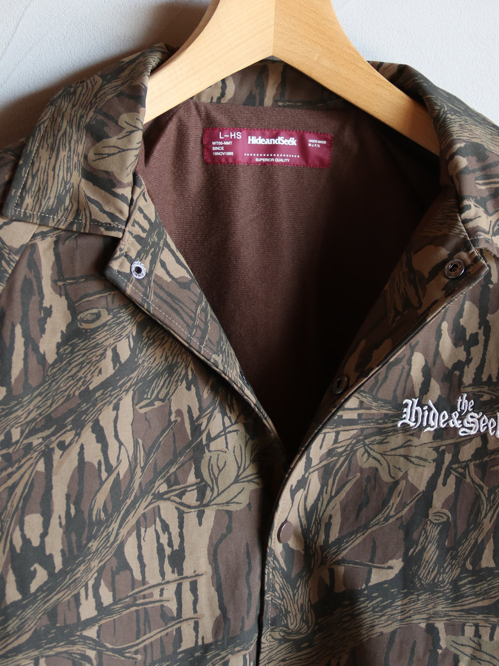 【2026年10月10日 12時から販売開始】HideandSeek×Toru Nishiura / The H&S Team Jacket (Camo) / H30th-091326c