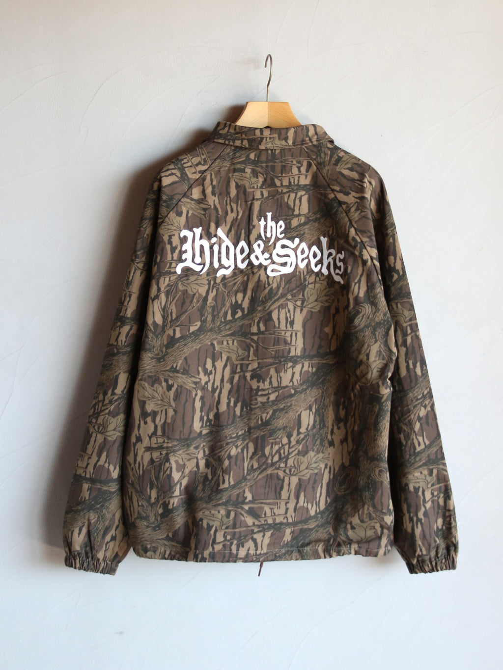 【2026年10月10日 12時から販売開始】HideandSeek×Toru Nishiura / The H&S Team Jacket (Camo) / H30th-091326c
