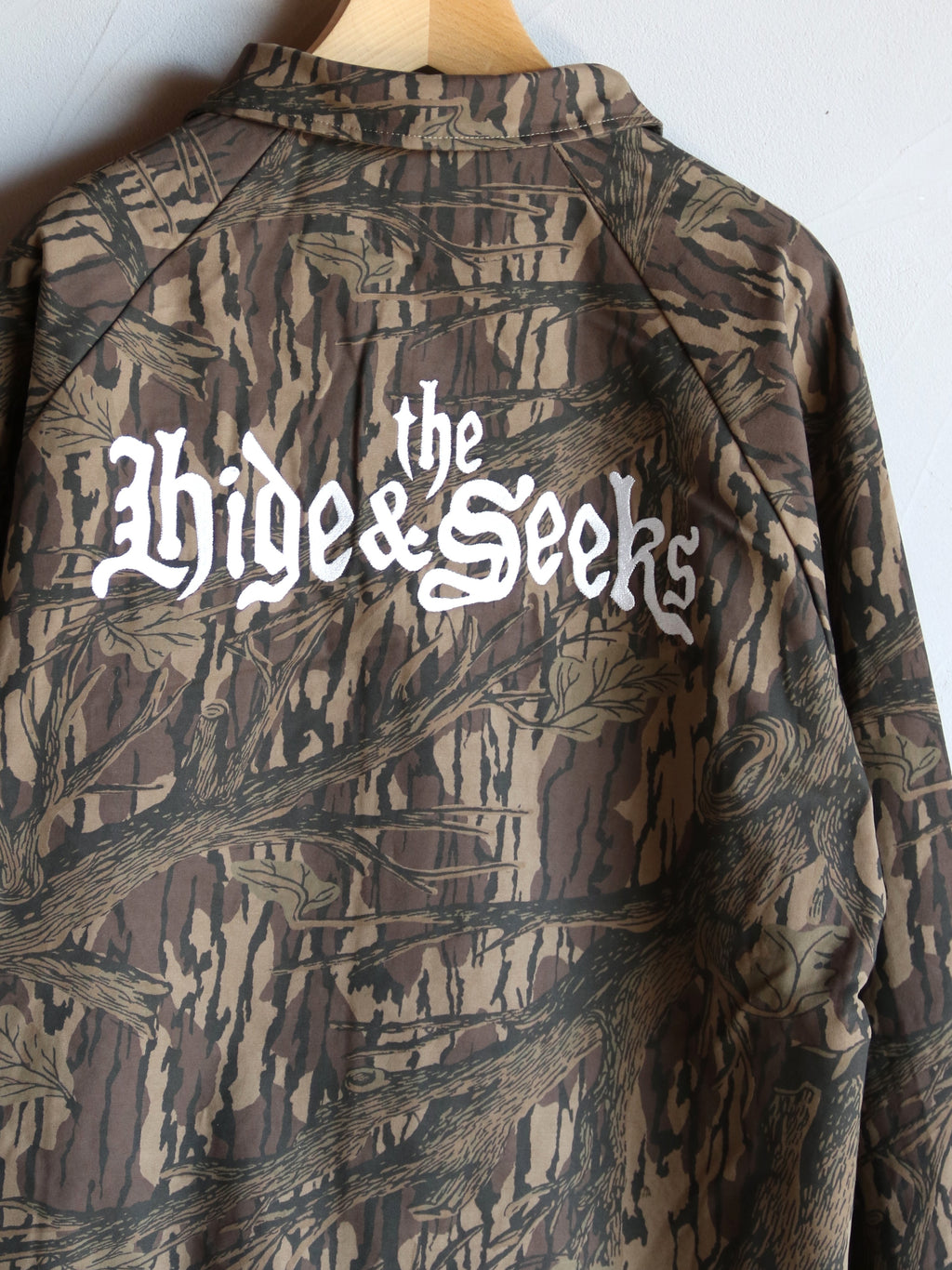 【2026年10月10日 12時から販売開始】HideandSeek×Toru Nishiura / The H&S Team Jacket (Camo) / H30th-091326c