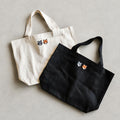 メゾンキツネ バッグ トート MAISON KITSUNE ダブル フォックスヘッド トート DOUBLE FOX HEAD PATCH TOTE BAG アントラシート/エクリュ 2026秋冬新作【mrubt23ww0096】